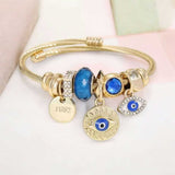 BLING Gold-Tone Evil Eye Charm Bracelet with Blue Crystal Beads – Adjustable Wire Bangle
